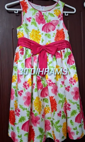Girls floral party dress with pink bow