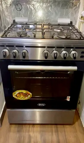 Stainless Steel 4-Burner Gas Cooker with Oven - Good Condition