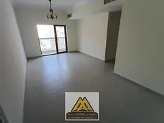 Brand-new 2-bedroom apartment in Al Hamidiya 1 with 3 bathrooms and a balcony. Free parking, gym, an