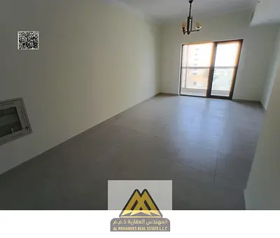 Brand-new 2-bedroom apartment in Al Hamidiya 1 with 3 bathrooms and a balcony. Free parking, gym, and swimming pool. AED 50K yearly, 4 payments. Luxur