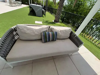 Outdoor woven rope sofa with cushions - good condition