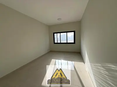 One-bedroom apartment with living room in Al Jurf 3, Ajman. Closed living room, one bathroom, central AC, no balcony, close to Dubai exit. AED 31,000