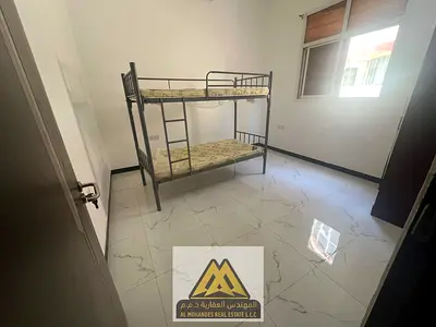 فرصة مميزة للإيجار السنوي في منطقة المويهات 3 بعجمان، شقة غرفة وصالة تقع في الطابق الأرضي، بتصميم عملي ومريح يناسب الأفراد والعائلات الصغيرة