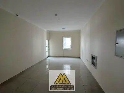 1-bedroom apartment with living room in Al Jurf 2, Ajman, on Sheikh Ammar Street, balcony, 2 bathrooms, free parking, central AC, gas and maintenance