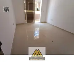 For rent in Al Jurf Industrial 3: Spacious 1-bedroom apartment with living room, balcony, and centra