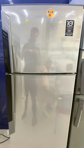 Used Silver Top-Freezer Refrigerator - Good Working Condition