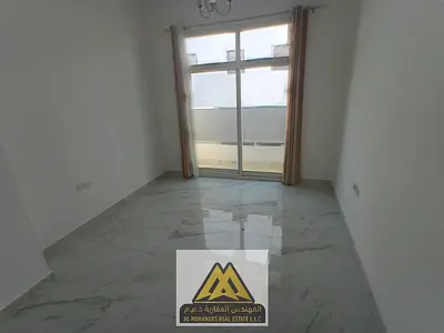 One-bedroom apartment with living room in Al Jurf 3, Ajman. Central AC, balcony, 2 bathrooms, closed kitchen, prime location near the Chinese Market.