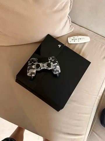 PlayStation 4  with DualShock Controller - Good Working Condition