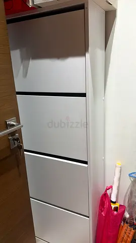 Modern white shoe storage cabinet with pull-out drawers