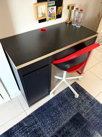 Red and black desk with chair
