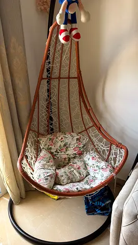 Hanging Rattan Egg Swing Chair with Floral Cushion
