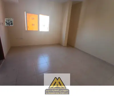 Studio in Al Nuaimiya 2, Ajman. Annual rent 18,000 AED. Prime location near services, semi-separated kitchen, good finishing, 4 payments.