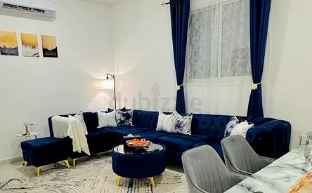 Navy Blue Velvet Chesterfield Sofa with Matching Ottoman and tea table- Very Good Condition