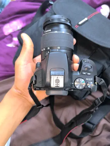 Canon DSLR with 18-55mm Kit Lens and Carry Case - Good Working Condition