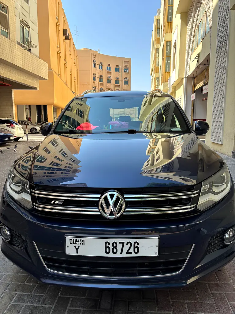 Volkswagen Tiguan 2014 — photo 1 of 11