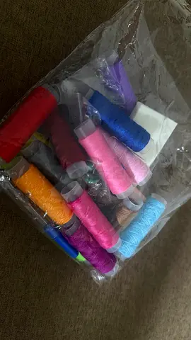 Pack of assorted colorful sewing threads (multiple spools) - unused