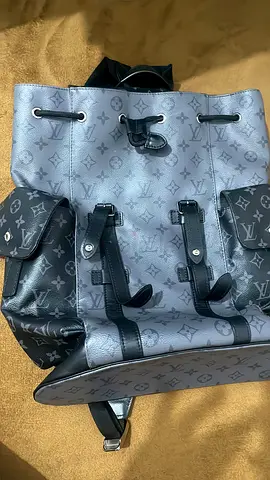 Gray monogram canvas backpack with flap and buckle straps (pre-owned)