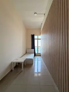 Semi- Spacious Partitioned Room with balcony access/toilet shared with one female