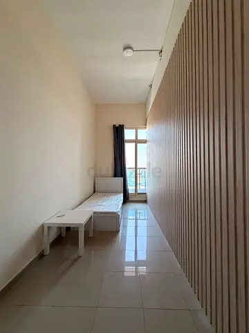 Semi- Spacious Partitioned Room with balcony access/toilet shared with one female