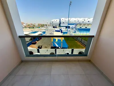 Al Nasr Central Building with Pool