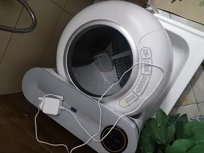 Electric self cleaning litter box. Controlled by mobile phone