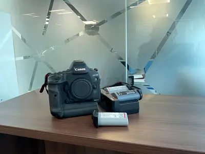 Canon EOS 1D X Mark II body with batteries and charger