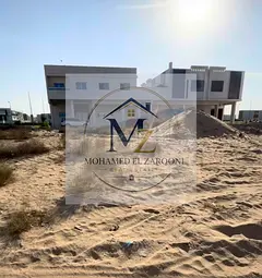Commercial land for sale in Al Hawshi area