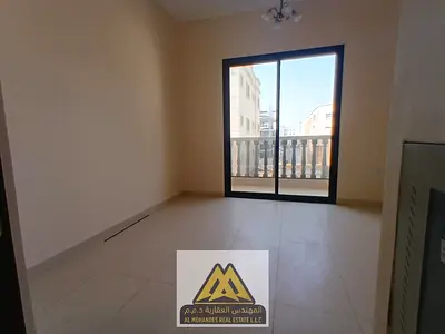 A fantastic one-bedroom apartment with a master suite, brand new, for annual rent in Al Alia, payable in 4 installments.