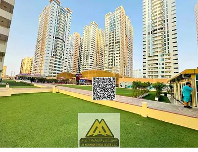 عرض متكامل استديو بباركن وخزائن بالحائط بابراج عجمان وان مساحه كبيرة