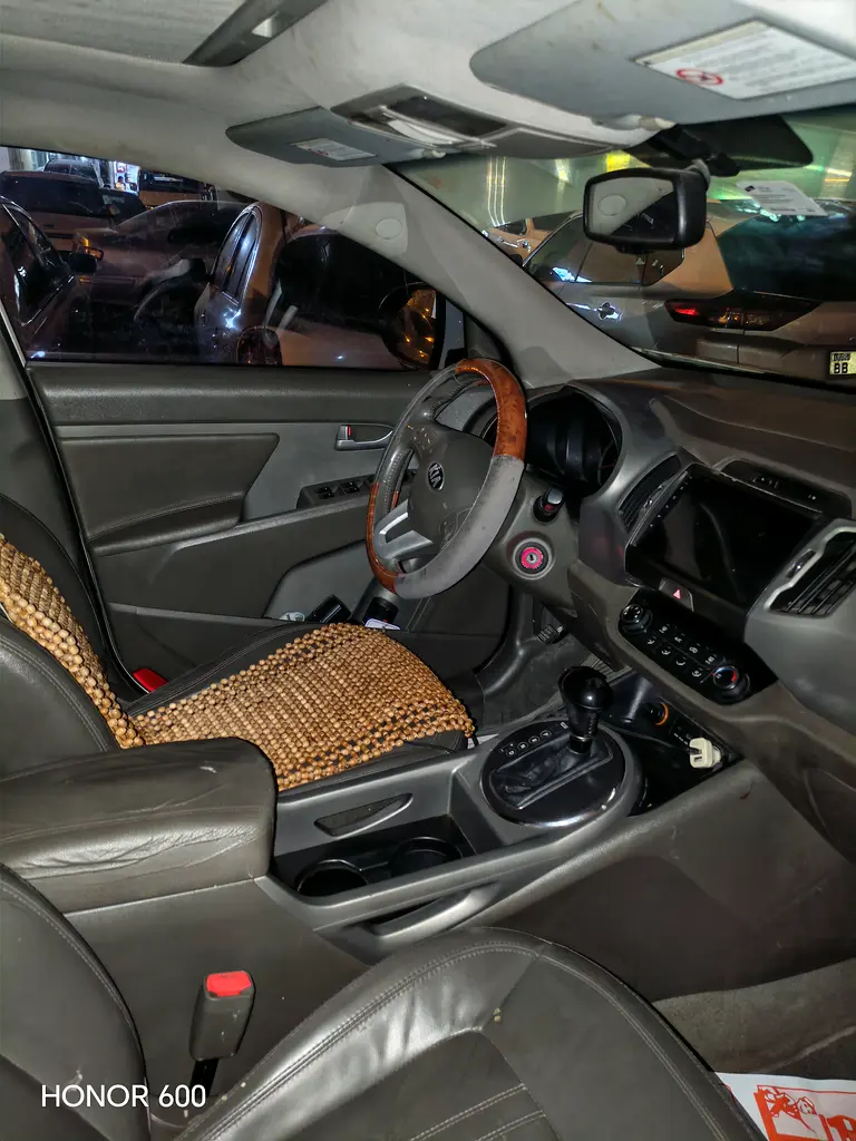 Kia Sportage 2013 — photo 1 of 18