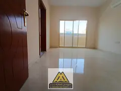 Annual Rental in Al Alia – Spacious 1-bedroom apartment with living room, balcony, and split AC. P