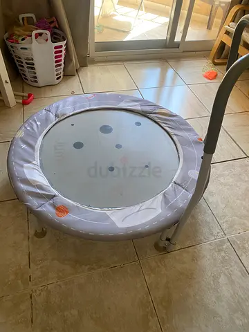 Portable baby jumper/bouncer seat with toy bar (lightly used)