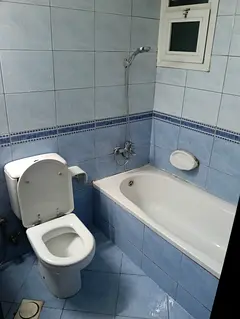 Large bedroom with attached balcony available for family use.