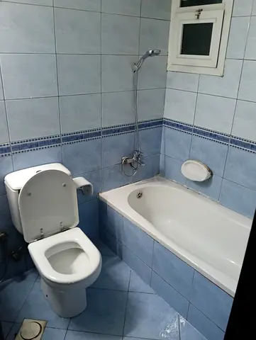 Large bedroom with attached balcony available for family use.