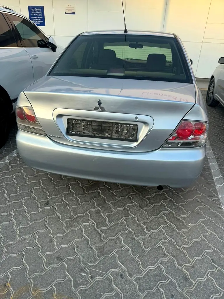Mitsubishi Lancer 2009 — photo 1 of 6