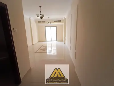 2-bedroom apartment with living room in Al Nuaimiya 1, Ajman, balcony, 2 bathrooms, large space, central AC, AED 33,000 in 4 installments, excellent v