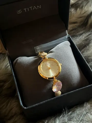 TITAN RAGA Raga Womens Charm: Elegant Mother of Pearl Dial with Ornate Strap Watch For sale