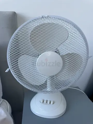 White oscillating table fan - used, working