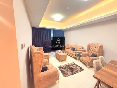 For annual rent in Al-Ghalfa Towers, a furnished apartment with modern finishing, two rooms and three bathrooms