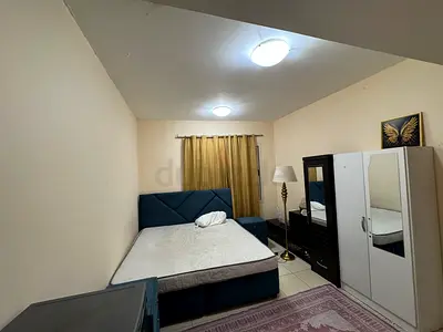 FULLY FURNISHED Big Master room is available including DEWA WiFi Cocking Gas and covered Parking