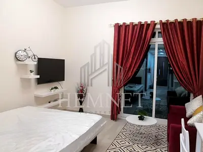 Stylish Furnished Studio | Balcony | Partial Skyline View