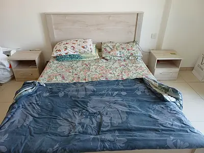 Queen bed frame with matching bedside tables - light wood
