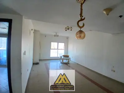 A balcony offering excellent ventilation and natural light. Built-in wardrobes. A separate laundry room. Free parking.