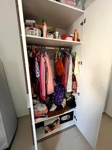 White wardrobe with hanging space and shelves