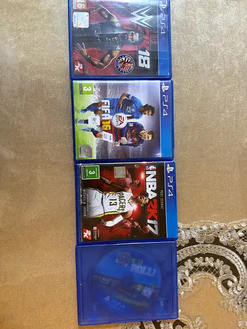 Used PS4 Games Bundle - FIFA 16, NBA 2K17, WWE 2K18, PAW PATROL on a roll (4 discs)