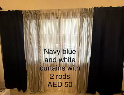 Navy blue blackout curtains + white striped sheer set with 2 rods