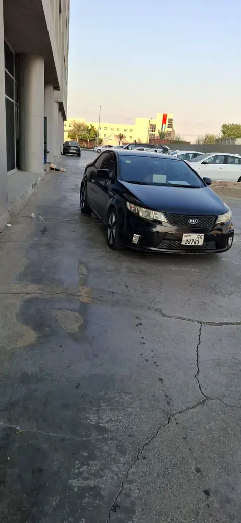 Kia Cerato 2013 — photo 1 of 7