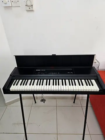 Casio CPS-100 Portable electronic keyboard with stand - good working condition. AC/DC.61 keys.