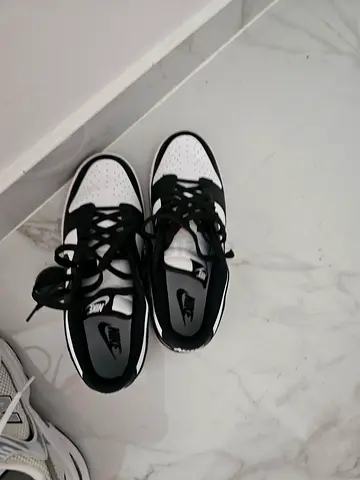 Nike low-top sneakers in black and white, size available