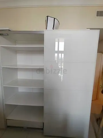White Sliding Door Wardrobe with Shelves - Good Condition